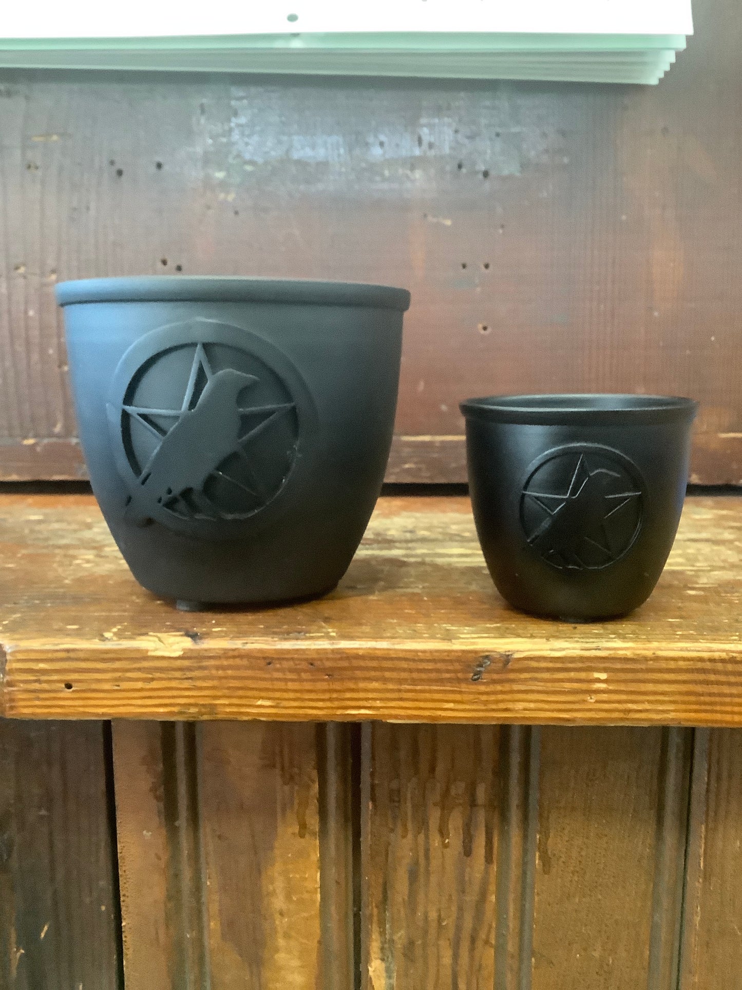 Metal smudge pot with raven and pentacle