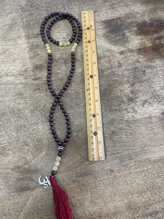 Om charm Garnet & Rutilated Quartz Mala