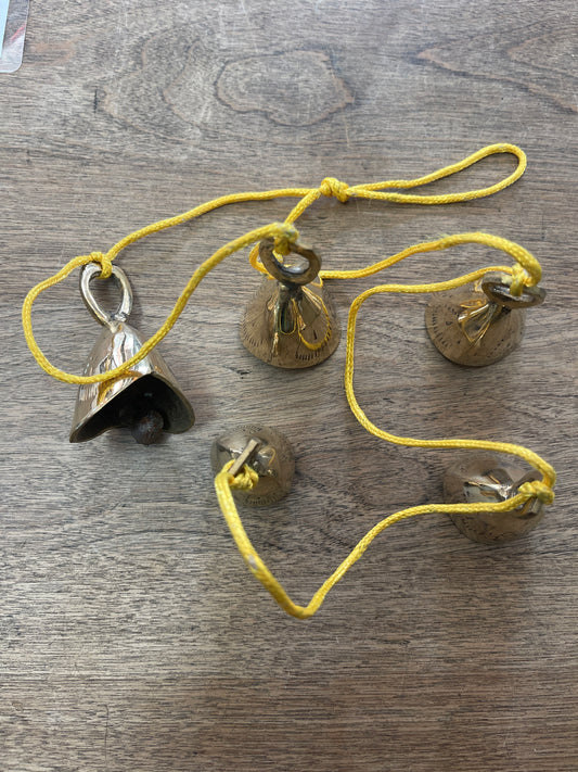 Brass Bells Knotted on Gold Cord