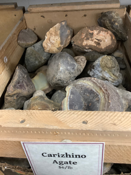 Carizhino agate rough by pound in crate