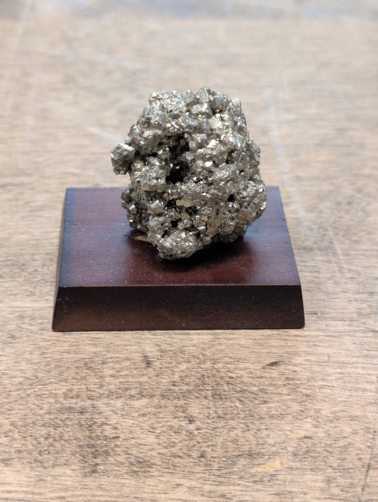 Pyrite on Wood Base